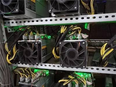 A state-of-the-art cryptocurrency mining farm with rows of high-efficiency mining rigs in France