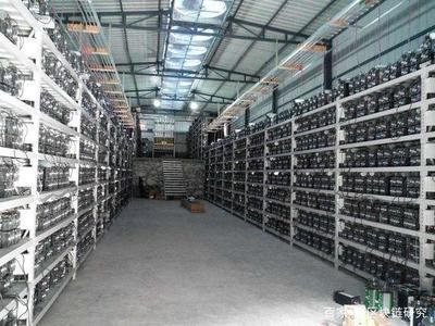 Overview of a cryptocurrency mining farm filled with mining rigs